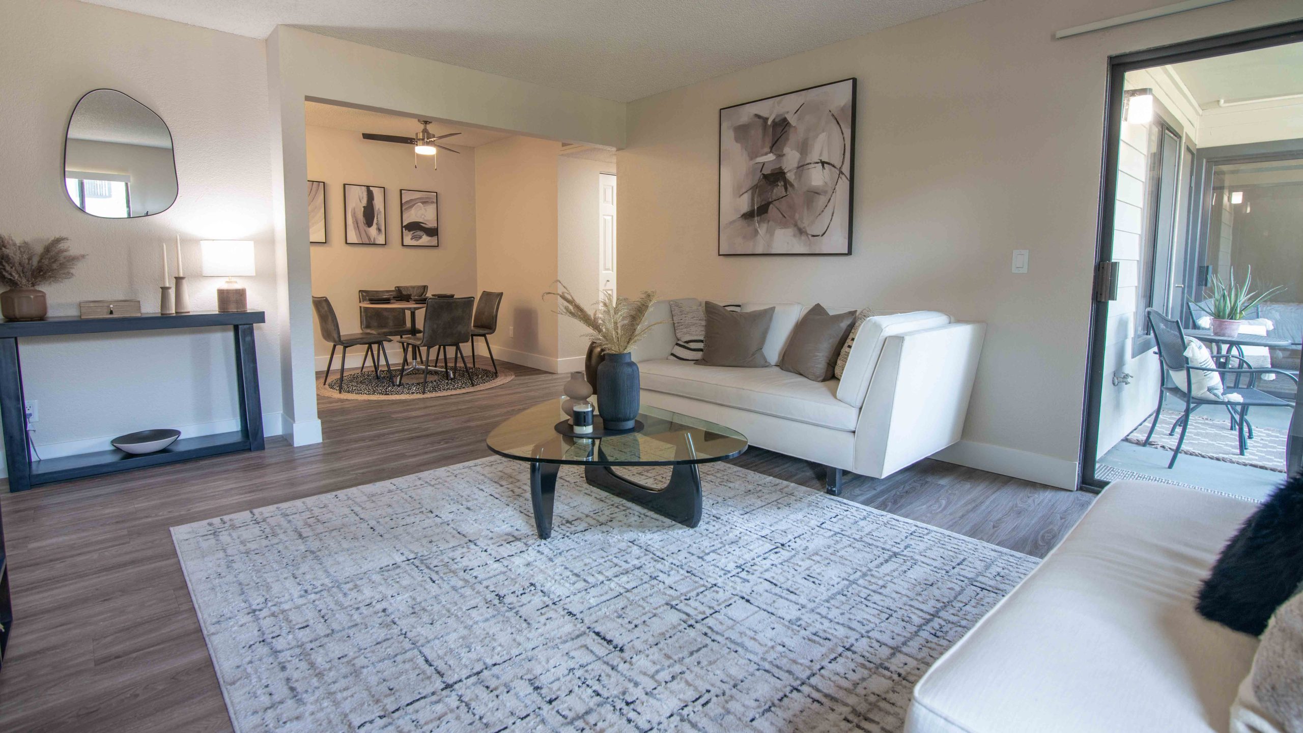 This before photo captures an appealing scene, featuring a relaxing fireside ambiance and an inviting pool, suggesting it&#039;s a perfect day for a swim.